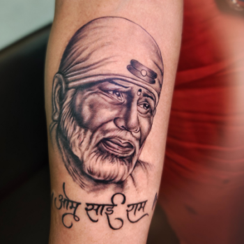 Religious portrait tattoo on forearm by Inkaura Tattoos in Pune.